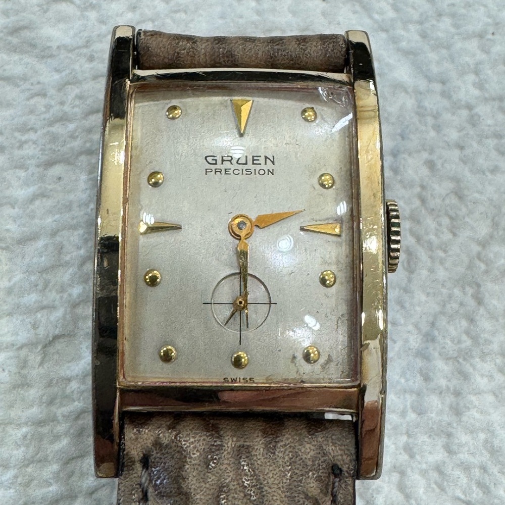 Gruen Precision Gold and Brown Men's Watch
10 karat gold Bezel
